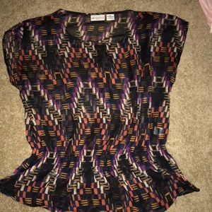 Tribal patterned flowy shirt.